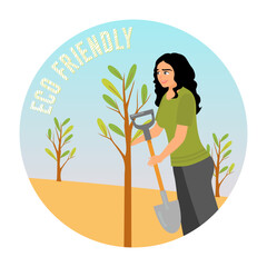 People planting trees concept. Young volunteer girl plant trees in city park.