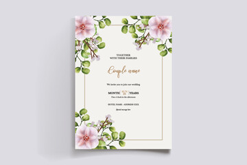 WEDDING INVITATION FRAME WITH FLOWER DECORATIONS AND FRESH LEAVES