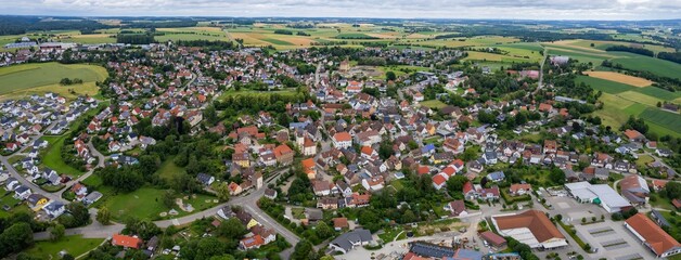 An aerial panorama view above the old town of the city Gerabronn on a cloudy summer day in Bavaria, Germany