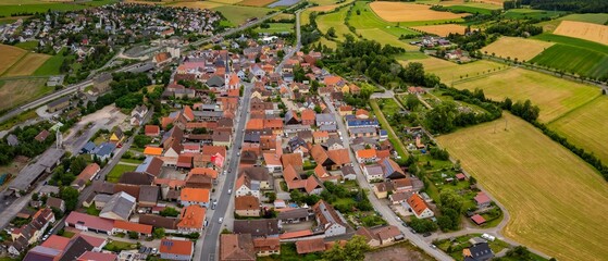 An aerial panorama view above the old town of the city Markt Bibart on a sunny summer day in Bavaria, Germany