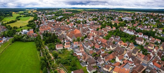 An aerial panorama view above the old town of the city Langenzenn on a cloudy summer day in Bavaria, Germany
