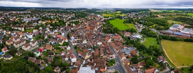 An aerial panorama view above the old town of the city Langenzenn on a cloudy summer day in Bavaria, Germany