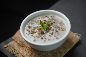 Traditional Indonesian mung bean porridge dessert with coconut milk