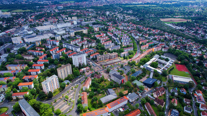 An aerial panorama view above the downtown of the city Hardhöhe Fürth during an overcast summer day in Bavaria, Germany.