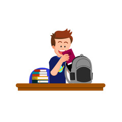 A boy puts a book into his school bag