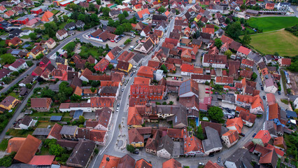  An aerial panorama view above the old town of the city Markt Erlbach on a cloudy summer day in...