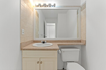 Bathroom with a white toilet and sink