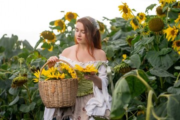 Sunflowers surround a woman holding a basket overflowing with blooms, evoking rustic charm and...