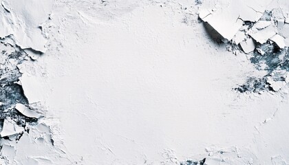 The image shows a detailed close-up of a white painted surface with significant cracking and peeling, revealing a dark underlayer in places.