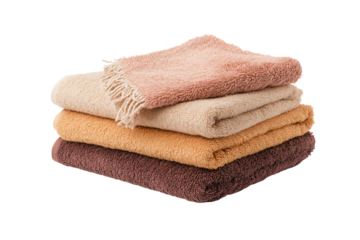 A stack of cozy, soft towels in warm tones, ideal for home decor or wellness themes.