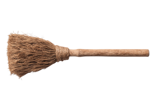 A traditional broom with natural bristles, isolated on a white background. - Powered by Adobe