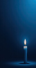 Fototapeta premium Single candle flame in deep blue