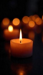 Close-up of flickering candlelight illuminating a vigil, creating a warm, intimate glow against a dark background Perfect for themes of remembrance, peace, or hope , shadows, darkness