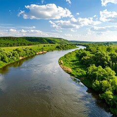 Scenic river winding through green landscape