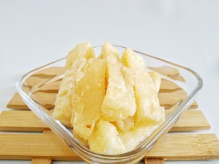 Fried cassava on a white background