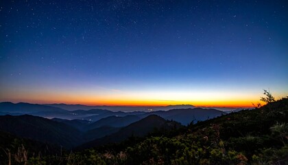 Mountains at dusk, starfield