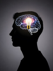 Obraz premium Conceptual image of an epiphany, with a galaxy lightbulb in a person's head