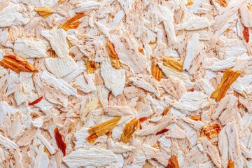 Textured wall covering with small, irregular, multicolored pieces