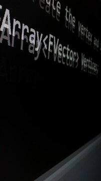 Closeup macro shot movement of coding script moving across LED screen with real-time AI-generated typing, showcasing advanced AI learning in optimization, debug and coding for software development.
