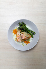 Crispy salmon with beurre blanc sauce.