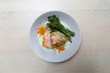 Crispy salmon with beurre blanc sauce.