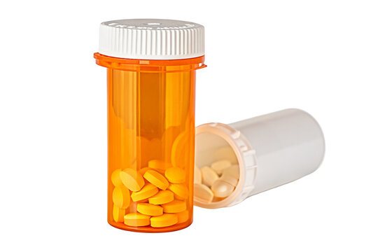 Prescription pill bottles with orange and white capsules for medicine and healthcare stock images