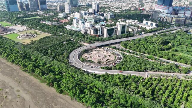aerial view of Noida Film city and Ambedkar park circle flyover, vehicles are going on the road in Noida Uttar pradesh