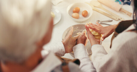 Hands, grandmother and grandchild with baking dough in home for cookies, learning and bonding. Family, senior woman and girl with pastry from above for scones recipe, culinary skills and development