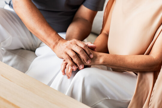 Senior couple holding hands showing love, care, and emotional support. Concept of lasting relationship, aging with dignity, trust, and family values in elderly life.