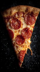 Pepperoni pizza slice with parmesan on black background