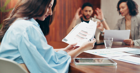 Boardroom, documents and reading with business woman in office for meeting, planning or review. Information, report and strategy with employee team in professional workplace for company development