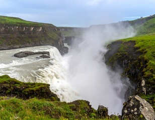Fototapeta premium Dramatic waterfall cascading down rocky cliffs