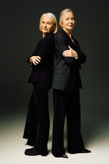 Elegant mature couple celebrating love in stylish attire with confidence and grace