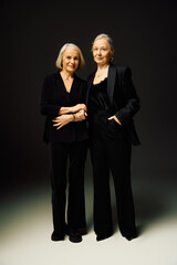 Elegant mature couple sharing a moment of love and connection in fashionable attire