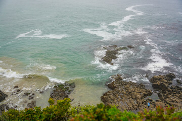 waves crashing on rocks