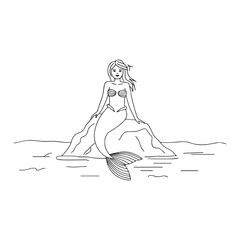 Elegant mermaid sitting gracefully on a shoreline with flowing hair and tail
