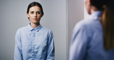 Bipolar, woman and reflection of mirror with psychosis, dissociation crisis and identity confusion....