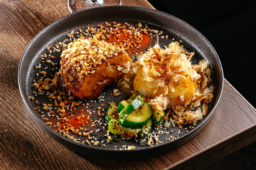 meat with rice, cucumber and sesame