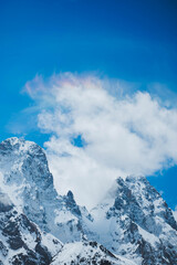 A Brocken spectre in the clouds in the Alps
