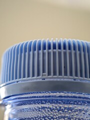 A closeup photo of a unique plastic bottle cap