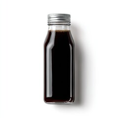 A clear glass bottle with a silver cap, filled with a dark, opaque liquid, is shown against a white background