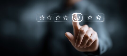 A person's hand selecting a happy face rating from a row of stars. The graphic is a glowing outline on a dark, blurred background