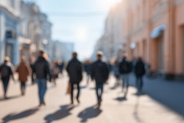 Blurred urban scene people walk down a street lined with light-colored buildings, sun shining, creating a soft, dreamy effect