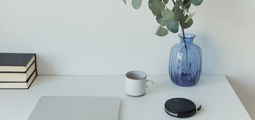 study table desk neat and clean for e-learning in living room setup for Digital learning online classes laptop and work from home 