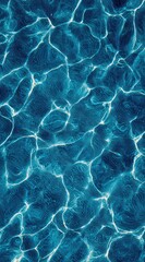 Aqua Surface. Abstract overhead view of turquoise water with refracted sunlight creating a mesmerizing wavy pattern on the floor