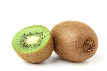 Kiwi halved fruit placed next to a whole kiwi. isolated on white background.
