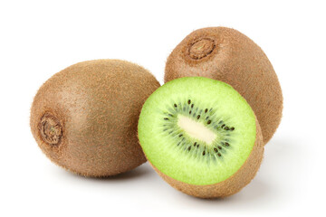 Kiwi halved fruit placed next to a whole kiwi. isolated on white background.
