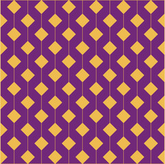 Small gold diamond shaped decorations hanging on thin gold threads, against a purple background