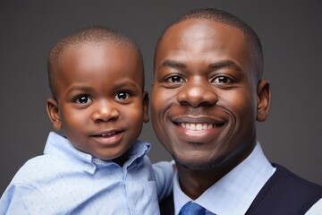 Smiling Father and Young Son Portrait