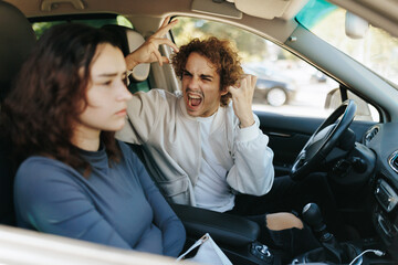 Angry Man Shouting at Upset Girlfriend During Heated Car Argument